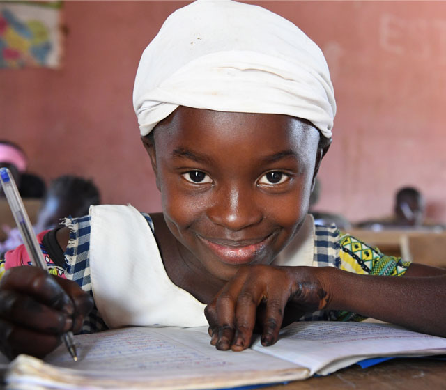 A girl attending class in an Islamic school in Biankouma, a village in the West of Côte d'Ivoire.