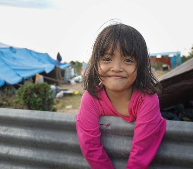 On 9 October 2018 in Indonesia, Ence, 6, is receiving psychosocial services, after the recent tsunami which destroyed her home. Social workers, who received training from UNICEF and the government on mentoring children in disaster and emergency situations, hope the siblings will return to their homes and schools