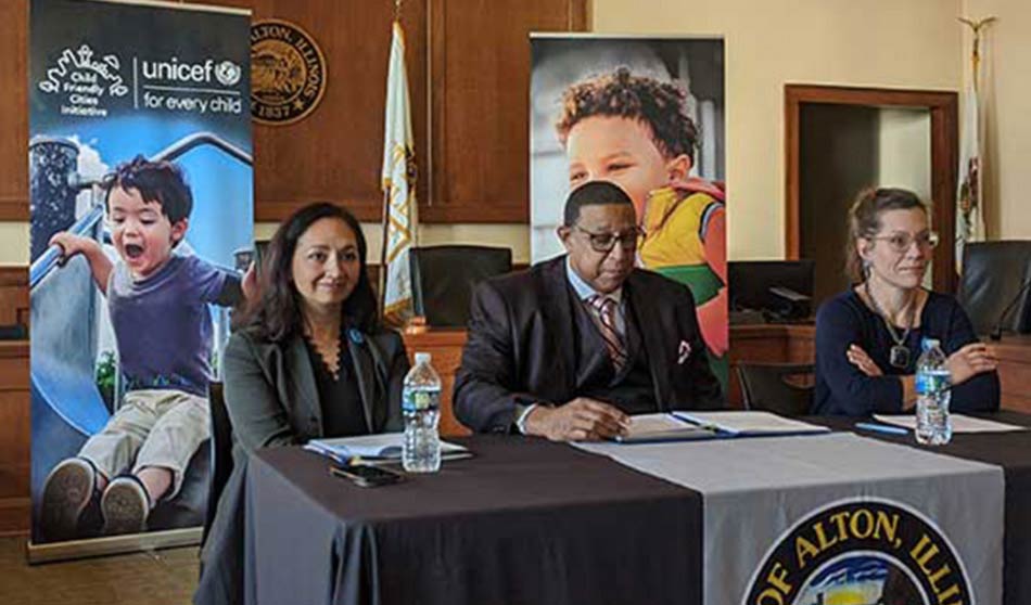 City of Alton press conference on October 30, 2023 announcing Alton's CFCI partnership with UNICEF USA. At left, Tracy Nájera - Vice President of U.S. Programs at UNICEF USA, is joined by Alton Mayor David Goins and Dr. Anne Sheer - Assistant Professor at SIU School of Medicine