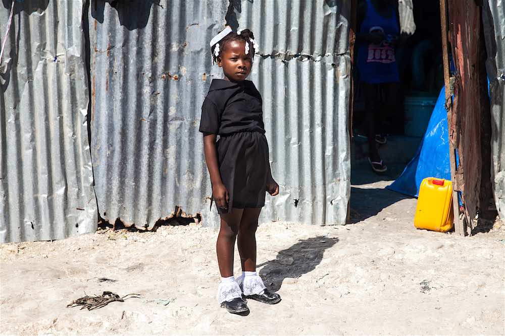Eight-year-old Haitian girl, Loudina Bien Aimer, orphaned by Hurricane Matthew, on the way to her temporary, UNICEF-supported school in Jérémie.