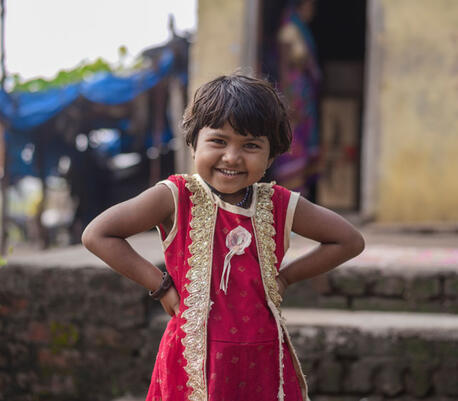 Bharti Raju, 5, poses for photograph outside her house at Shirasgaon Mandap village in Jalna, Maharashtra on Sunday, 19, Oct. 2020.