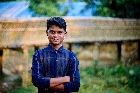 Anayet, 15, an adolescent peer leader, stands outside a UNICEF-supported multi-purpose center in the Rohingya refugee camps in Cox’s Bazar, Bangladesh, on Nov. 7, 2023.