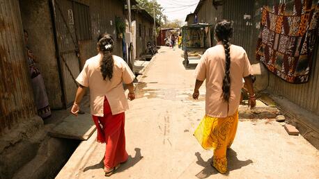 Asha workers Sonali D Gaikwad and Sujata D Gaikwad walk through the Ajanta Nagar slum in Pimpri to mobilise parents and children for vaccination as part of IMI 4.0.