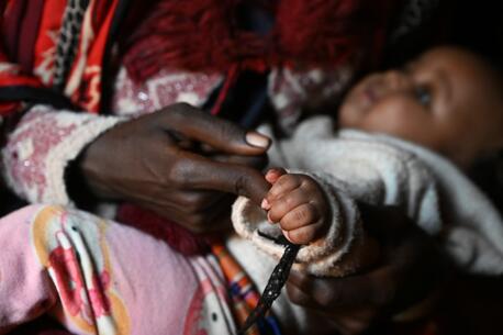 An 18-year-old mother, who was raped by a man who later disappeared, with her 4-month-old daughter at a UNICEF-supported IDP site in in the Borena zone, Oromia region, southern Ethiopia.