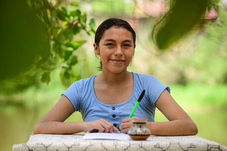 Susan, 16, of Peru's Ucayali region, writes a "Dear adults" letter as part of UNICEF's campaign for World Children's Day 2024.