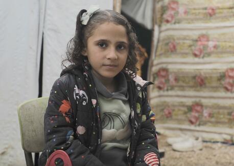 In Gaza, Qamar, 7, lives in a tent with her mother, battling physical and emotional trauma after losing her leg. She is one of thousands of children who have suffered conflict-related injuries in Gaza in the last year and are now facing lifelong disabilities.