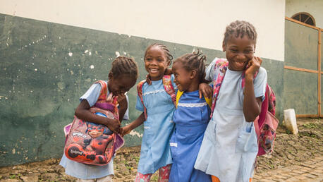 On 8 December 2020 in Sao Tome, Sao Tomé e Principe, a group of schoolgirls laugh on their way to school. ©UNICEF/UN0418198/Tremeau