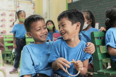 Students are happy to return to school at Hanginan Elementary, Maasin City, the Philippines. 