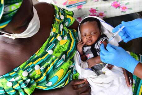 A baby is vaccinated at a UNICEF supported health center outside Abidjan, Côte d'Ivoire.