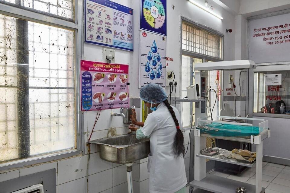 Following the steps for safe handwashing helps health care systems reduce the risk of infection and disease. A hospital worker at the District Combined Hospital in Lodhi, Sonebhadra, Uttar Pradesh follows the protocol. 