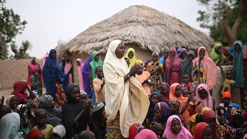 Villagers assemble for a sanitation awareness meeting in Tsalibawa village, Sokoto state, Nigaria, on March 14, 2024.
