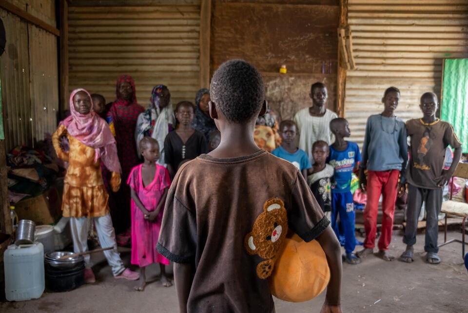 Children prepare for a soccer game at a camp for internally displaced people in Gedaref state, Sudan.