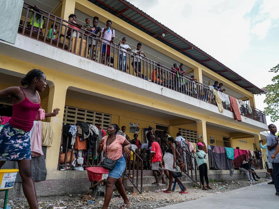 Displaced families crowd into Ecole Nationale Joseph Bernard des Freres in Haiti. 