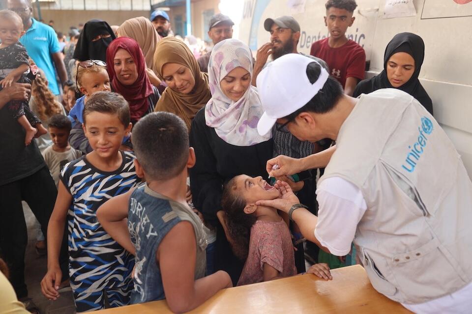 UNICEF staff administer polio vaccines at UNRWA health clinic in Deir al-Balah in the center of the Gaza Strip. 