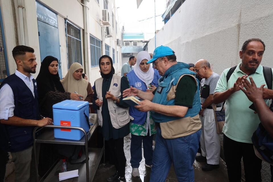 UNICEF staff prepare to administer polio vaccines at UNRWA health clinic in Deir al-Balah in the center of the Gaza Strip. 