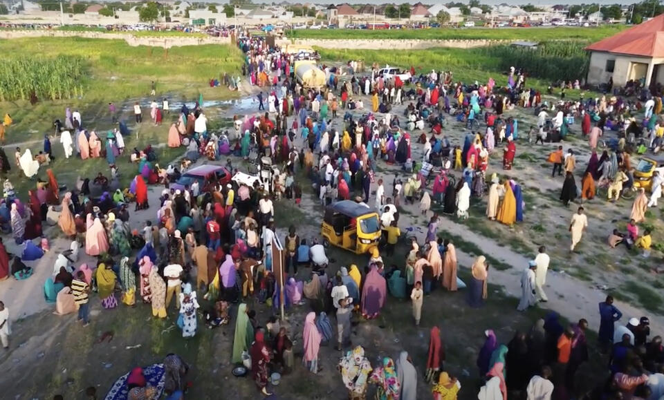 Aerial shot of families displaced by flooding in Maiduguri, northeast Nigeria, gathered at a UNICEF-supported displacement camp.