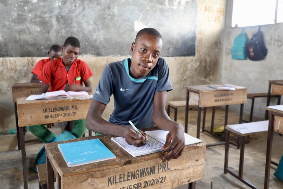 Student Hiribea Mohamed, 17, takes notes during a science class at a UNICEF-supported school in Tana River County, Kenya.