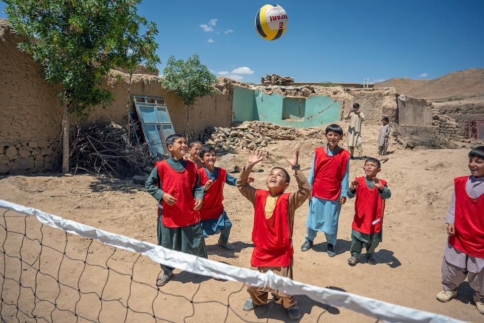 A group of boys play volleyball at the UNICEF-supported child-friendly space in Chaghcharan district, Ghor province, western Afghanistan.