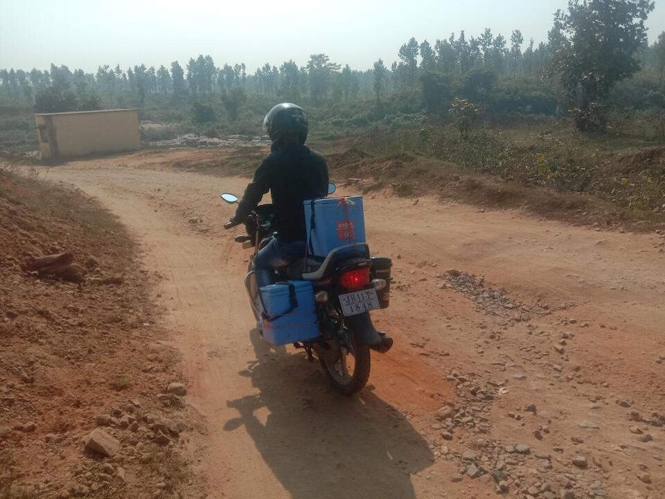 Vaccines are delivered by UNICEF and partners via motorbike to the village of Tulsidih and other immunization sites in Jharkhand, India.