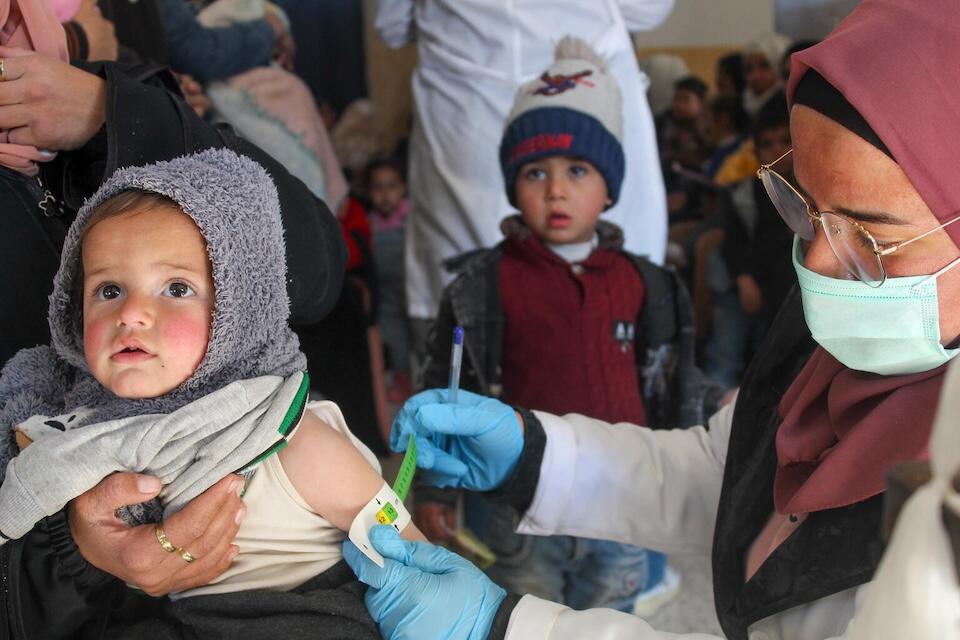 One-year-old Morei is screened for malnutrition by a UNICEF-supported health and nutrition mobile team in Obada village, Rural Damascus, Syria on Dec. 15, 2024.