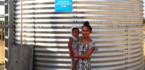 Estefany, a young mother of two in rural La Guajira, Colombia, works as a plumber in her village's locally managed, sustainable water treatment plant, built by UNICEF and partners.