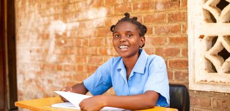 Kids in Need of Desks (K.I.N.D.) scholarship recipient Chisomo Daimon in Malawi. 