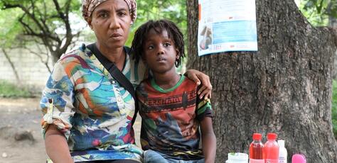 Carole Lafon and her twins were forced out of their home by violence in Port-au-Prince, Haiti. 