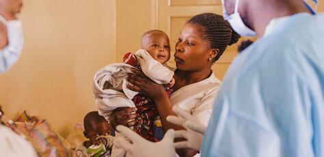 UNICEF DRC’s Deputy Representative, Dr. Mariame Sylla, speaks with a patient during her visit to the mpox isolation and treatment unit at Lwiro Hospital, in the Miti-Murhesa health zone, South Kivu province, Democratic Republic of the Congo, Sept. 4, 2024.