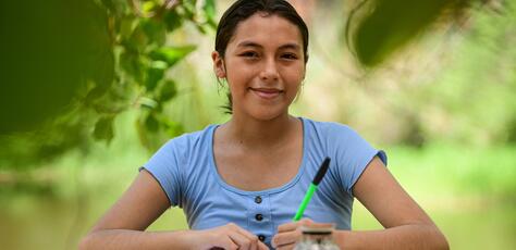 Susan, 16, of Peru's Ucayali region, writes a "Dear adults" letter as part of UNICEF's campaign for World Children's Day 2024.