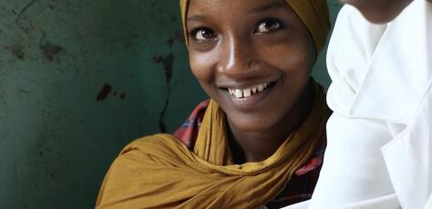 Zemzem, 13, in a classroom in rural Ethiopia where she has resumed her education after being rescued from a child marriage with help from a UNICEF-supported youth group.